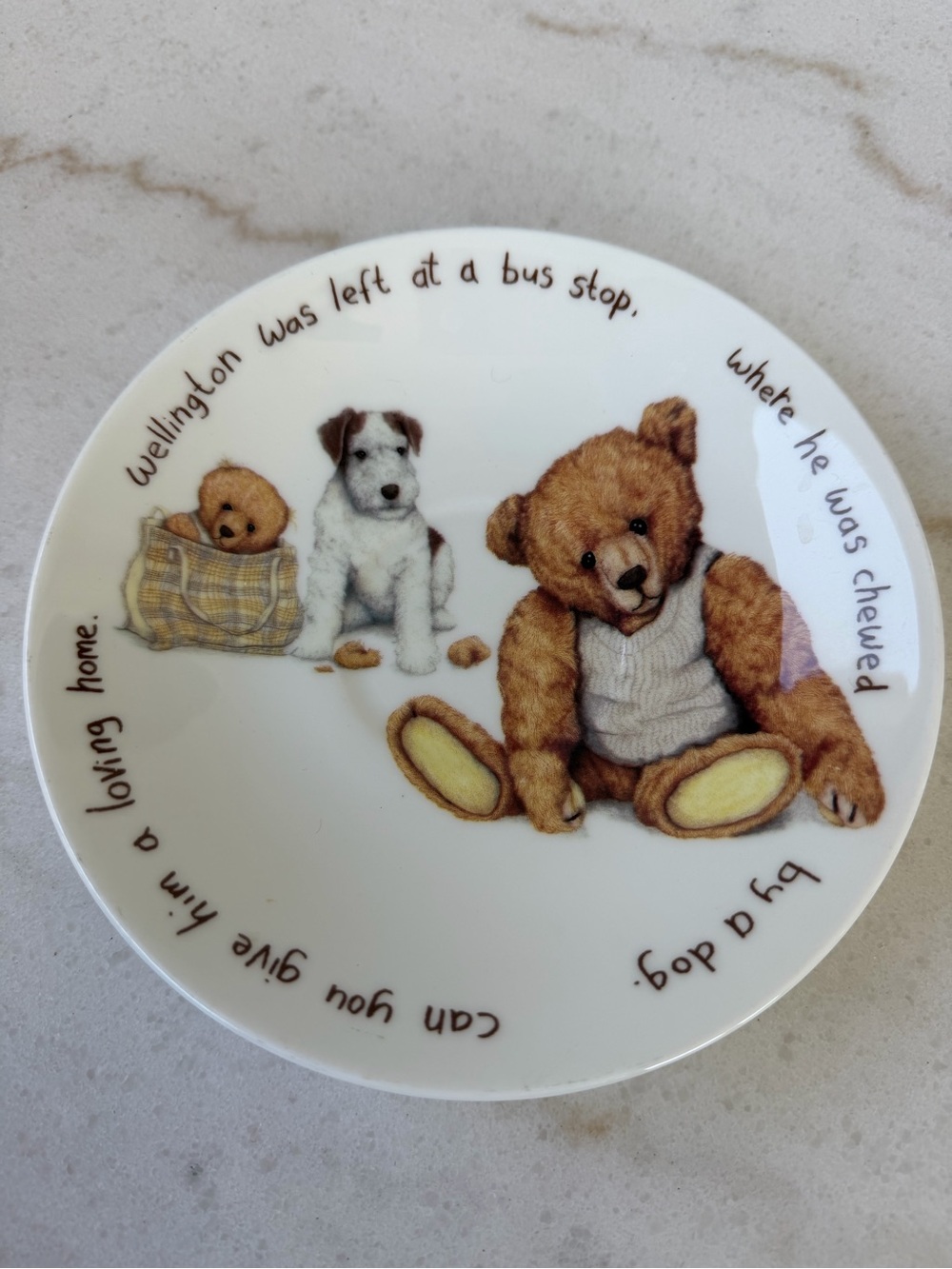 This is a Roy Kirkham fine bone china saucer from the "Lost Bears" collection.